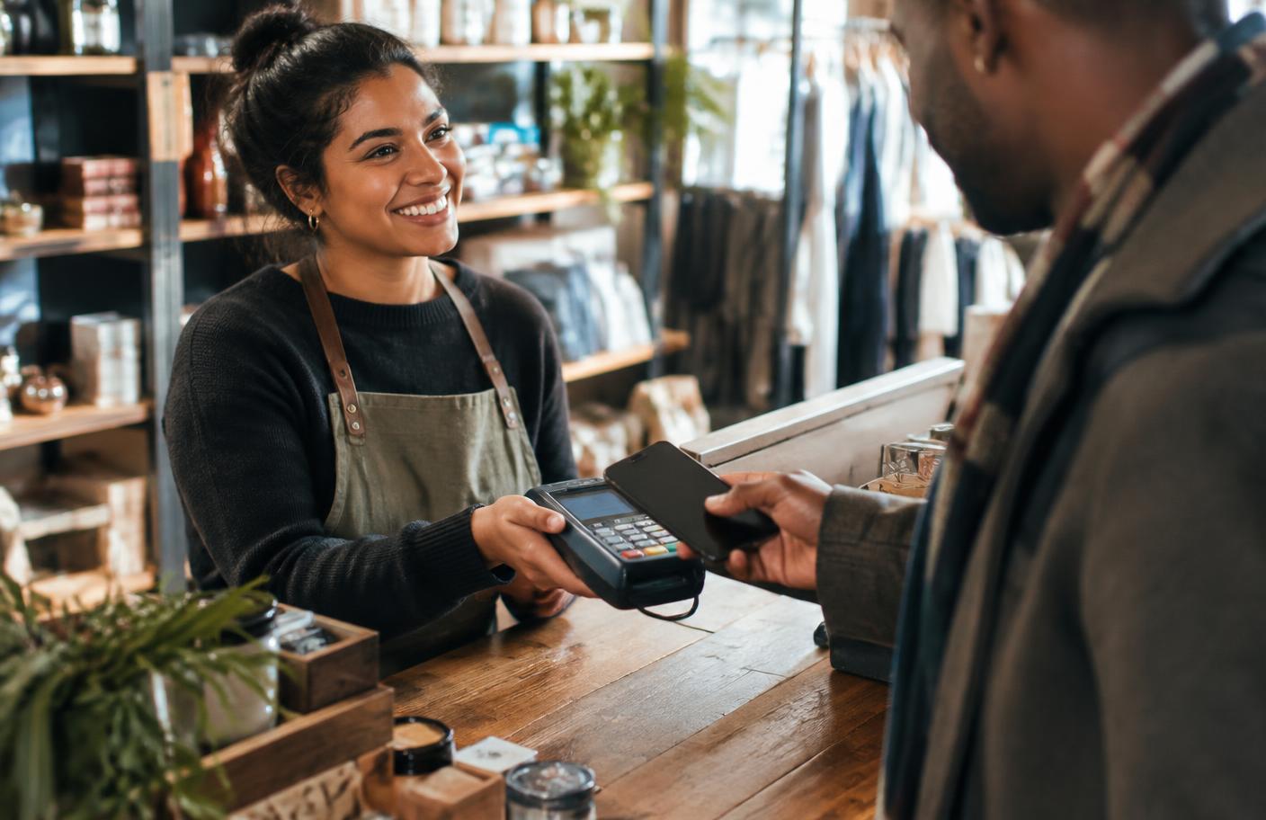 Customer using a mobile wallet and payment card